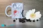 Preview: Moderne Kaffeetasse mit Blumenmotiven im Panoramadruck