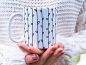 Mobile Preview: Kaffeetasse mit Muster - Zweige mit Knospen - Panoramadruck